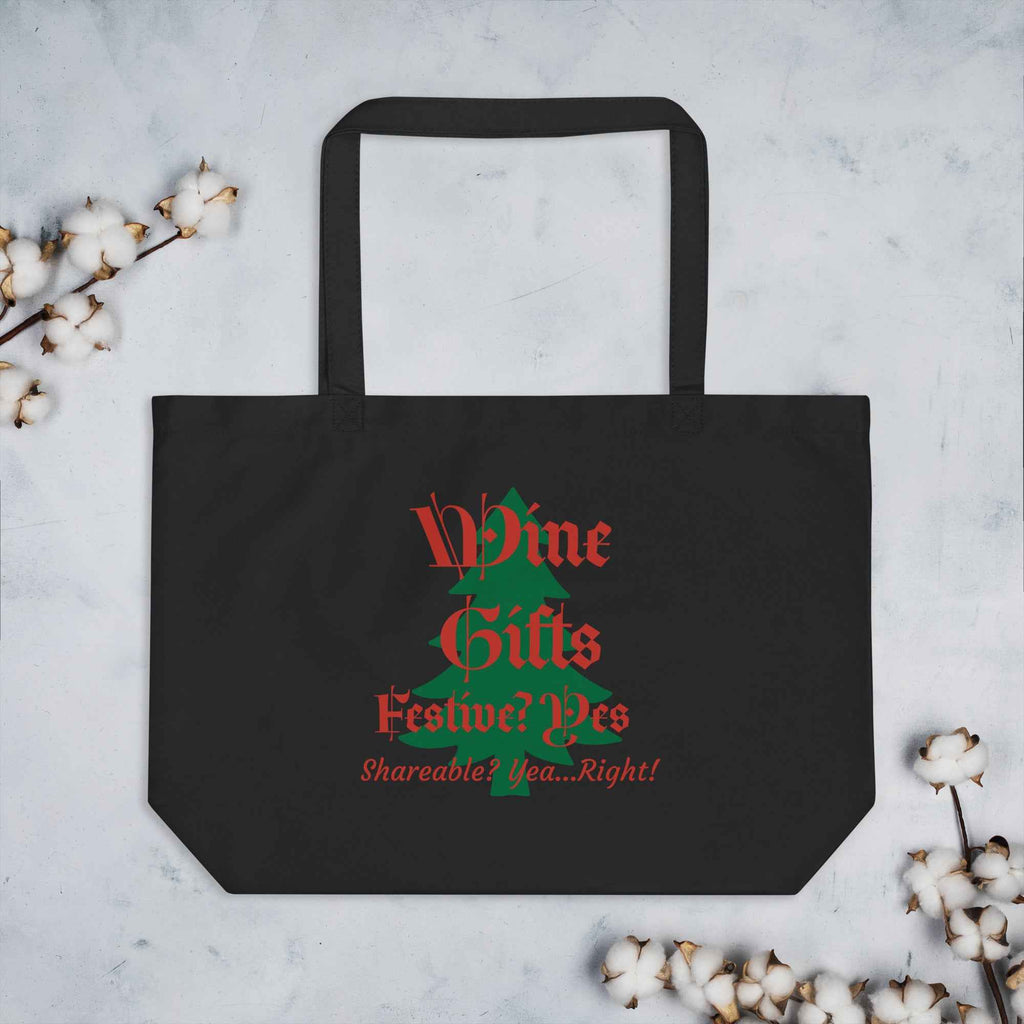 Black tote bag with red and green text shaped like a Christmas tree. Reads: “Wine Gifts—Festive? Yes. Shareable? Yea…Right!” Features a wine glass forming the “W” and a green tree silhouette. A humorous holiday gift for wine lovers.