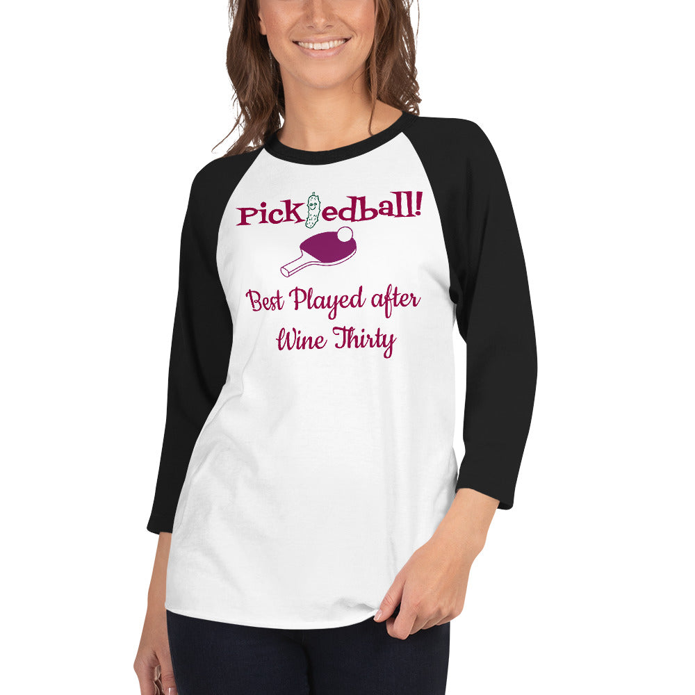 Women’s raglan-style shirt with wine-themed pickleball slogan ‘Pickledball! Best Played after Wine Thirty’—features pink paddle and ball graphic, lightweight fit, perfect for tipsy matches and spirited rallies.”

