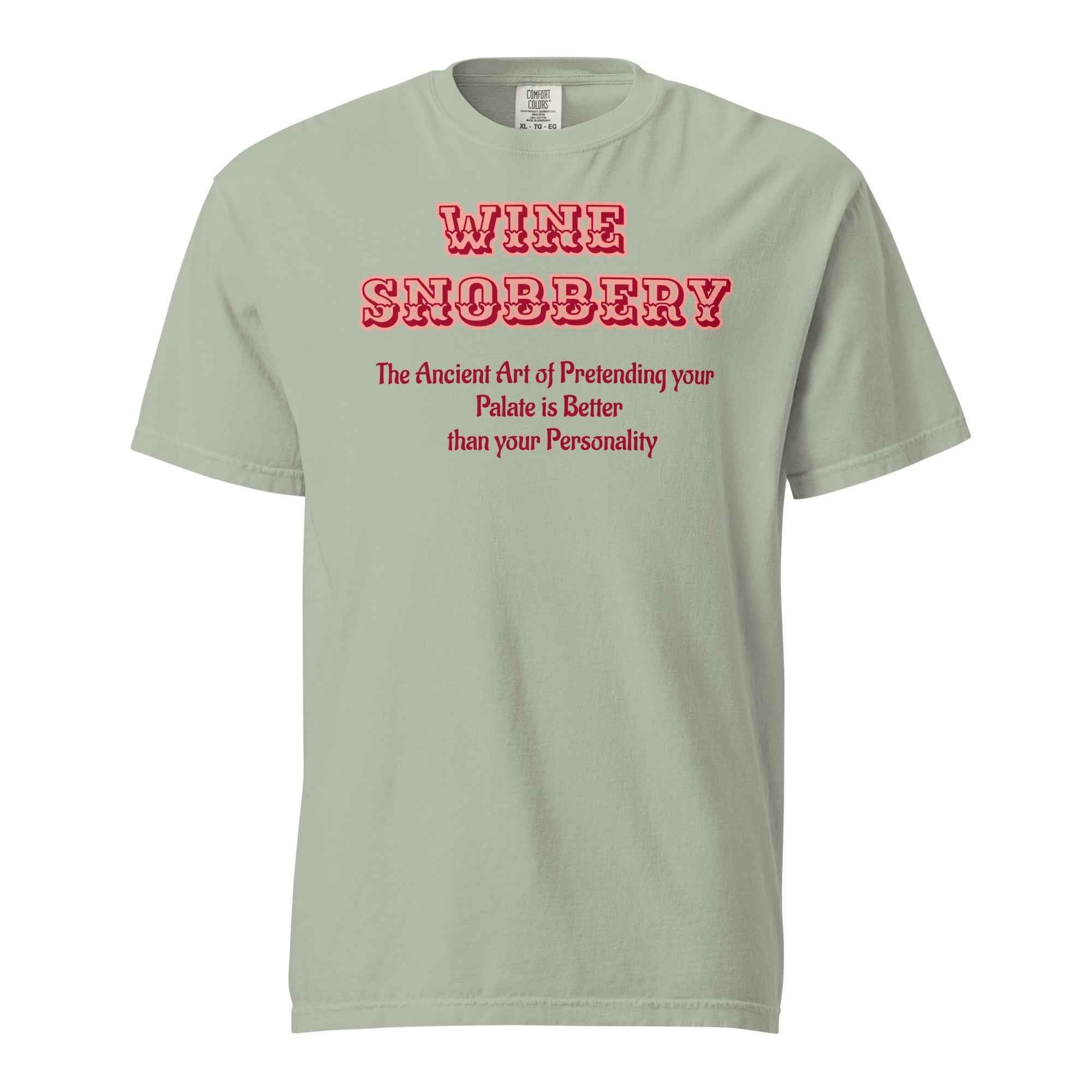 Green T-shirt with bold red text reading “Wine Snobbery: The Ancient Art of Pretending your Palate is Better than your Personality.”