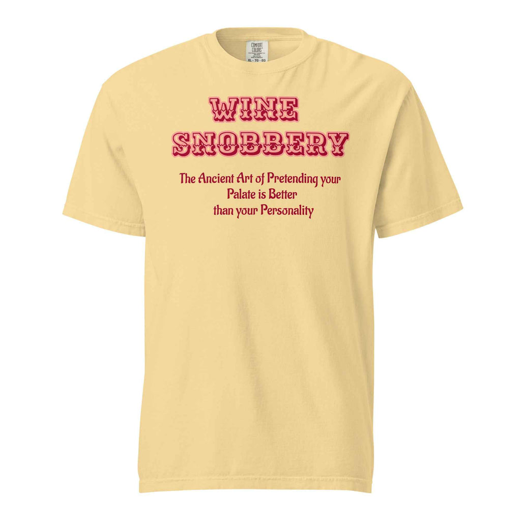 Yellow T-shirt with bold red text reading “Wine Snobbery: The Ancient Art of Pretending your Palate is Better than your Personality.”