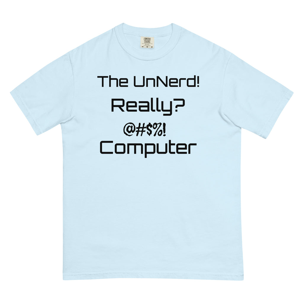 Light blue T-shirt with bold black text reading: “The UnNerd! Really? @#$%! Computer.” A stylized, expressive design that humorously captures tech angst and anti-nerd sentiment.