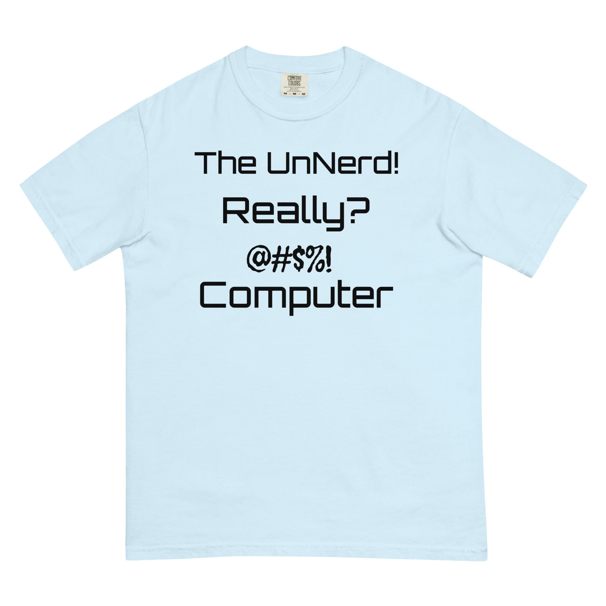 Light blue T-shirt with bold black text reading: “The UnNerd! Really? @#$%! Computer.” A stylized, expressive design that humorously captures tech angst and anti-nerd sentiment.