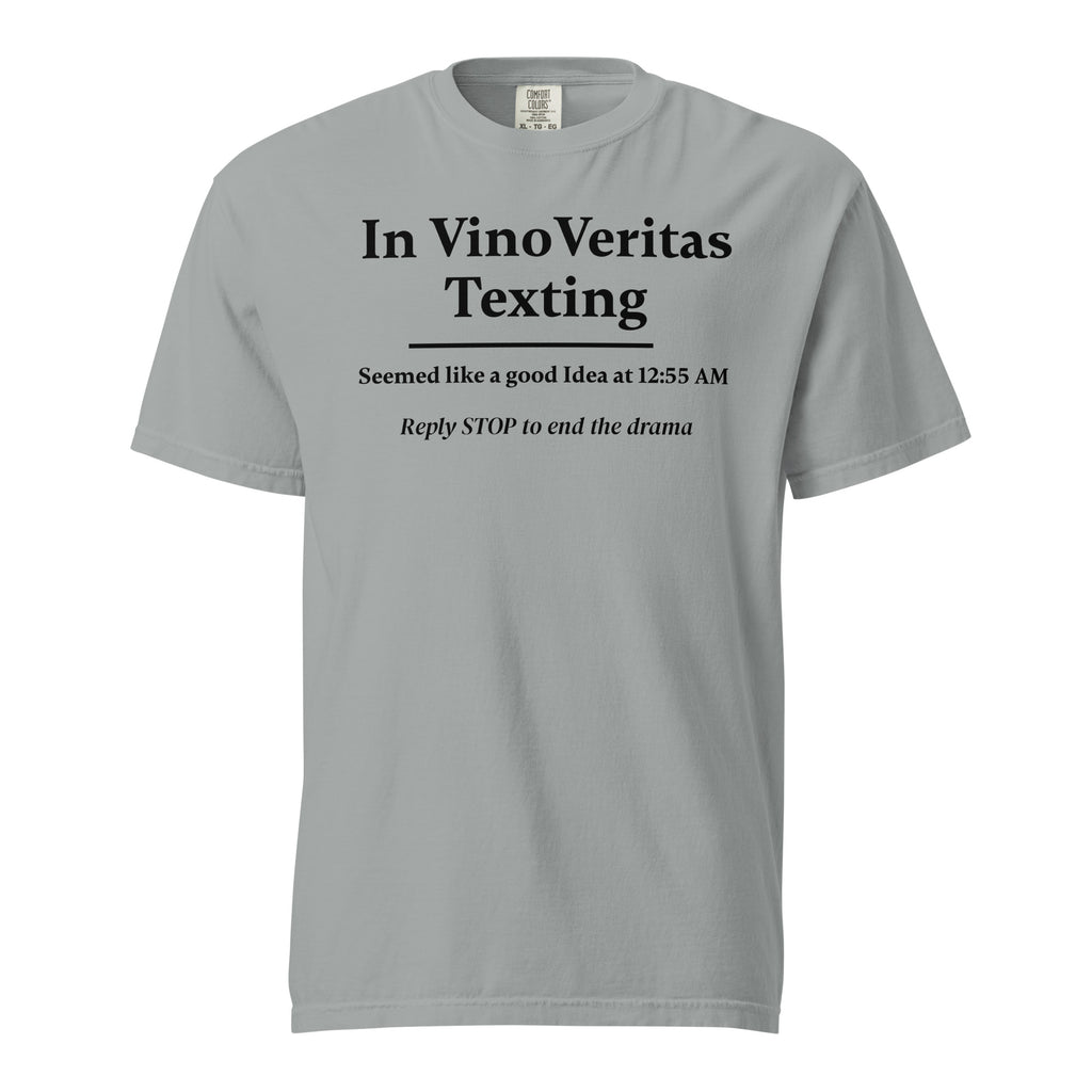 Light gray T-shirt with bold black text that reads: “In Vino Veritas Texting — Seemed like a good idea at 12:55 AM. Reply STOP to end the drama.” A humorous nod to wine-fueled late-night texting and automated message culture.