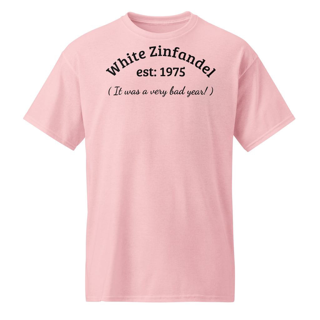 Pink cotton t-shirt with bold black text reading “White Zinfandel – Established 1975 – It Was a Very Bad Year,” styled with wine corks, vintage glasses, and a half-empty bottle to evoke sweet regret and wine trail nostalgia.
