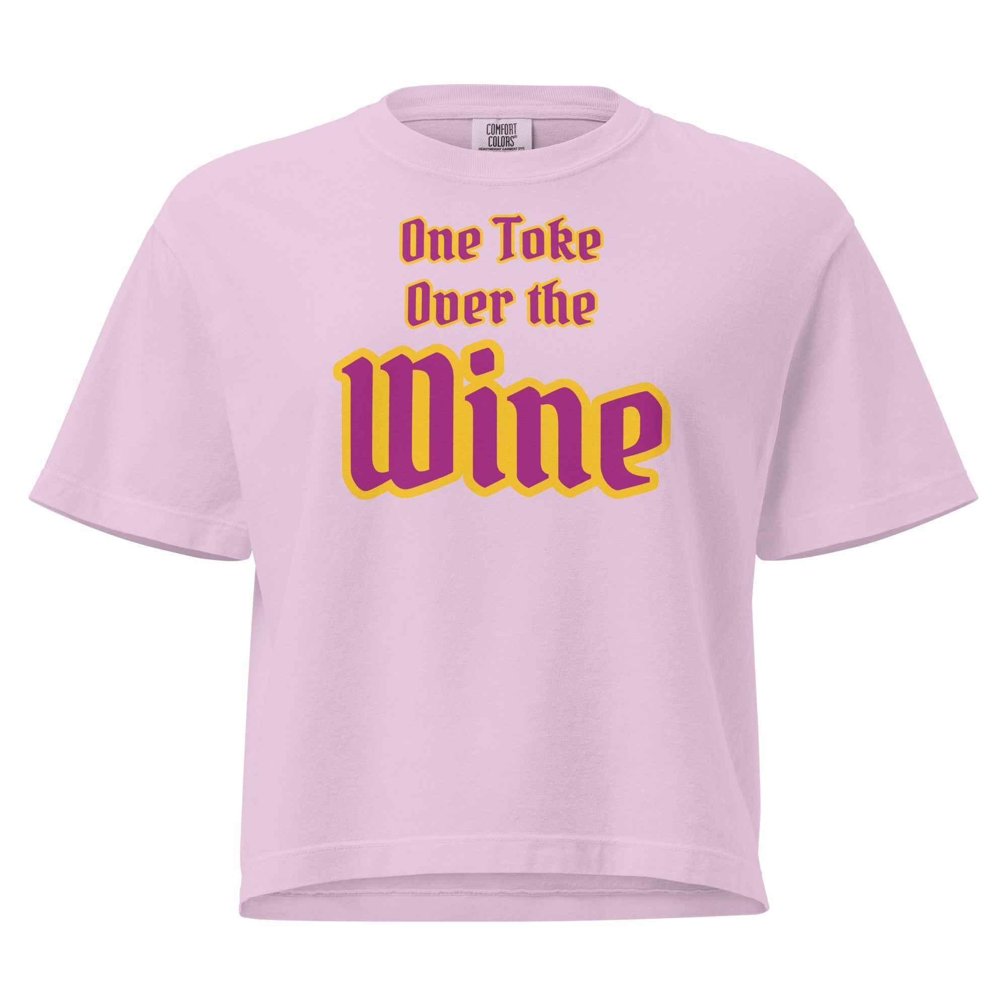 Pink t-shirt with stylized text reading 'One Toke Over the Wine'—a playful, wine-themed phrase with bold emphasis on 'Wine' for visual and narrative impact."