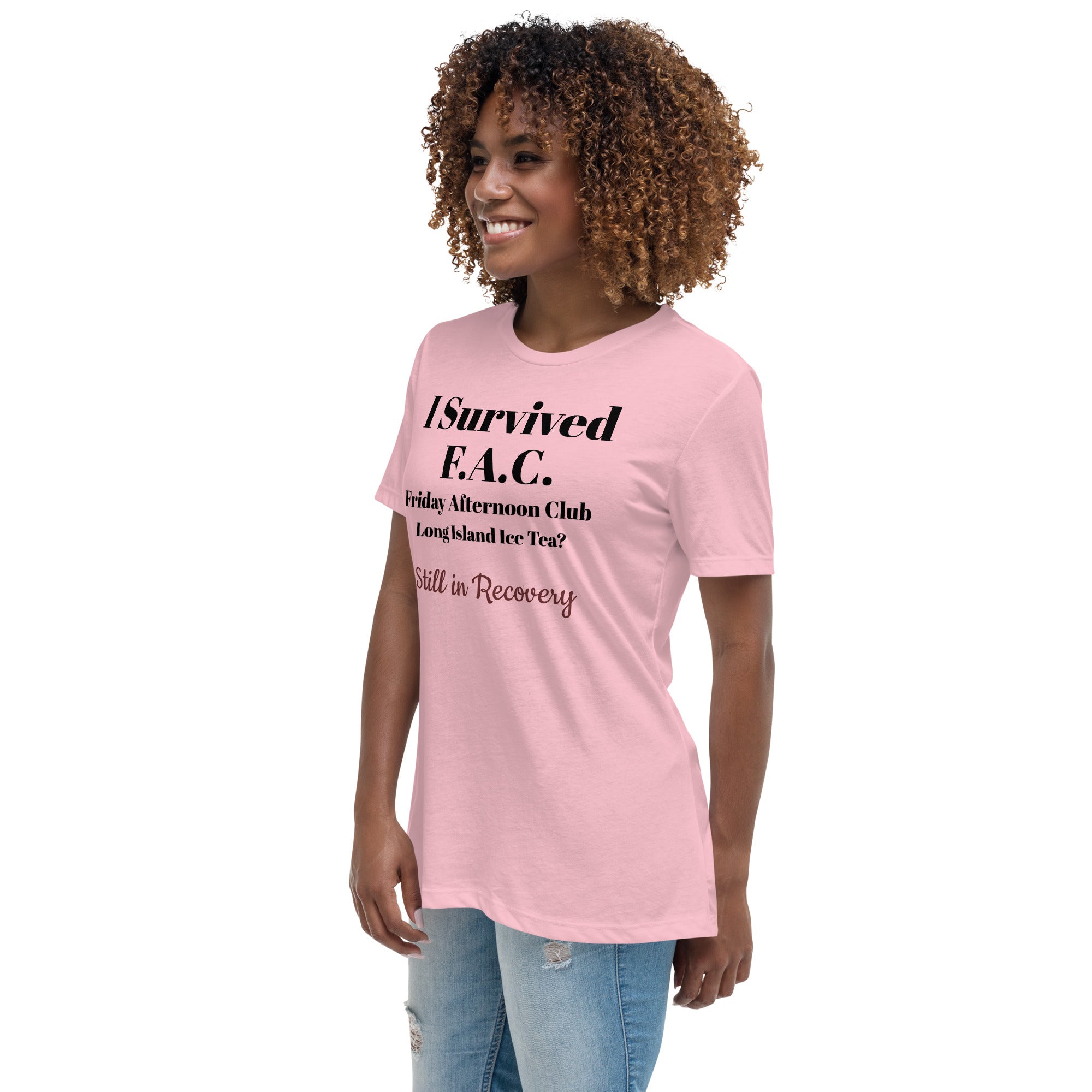 Pink cotton t-shirt laid flat with bold black text reading “I Survived Friday Afternoon Club – Still in Recovery.” Surrounded by wine corks, sunglasses, and a half-empty bottle, evoking post-party resilience and weekend rituals.